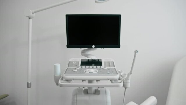 Medical office with ultrasound diagnostic equipment in the health clinic gynecological office