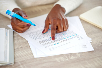Closeup, hands and black woman with documents, notes and lawyer checking contract, highlight and...