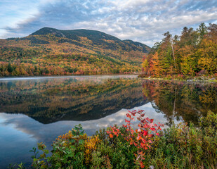 Autumn panorama with reflection at the Basin Brook Reservoir in the White Mountains of New...