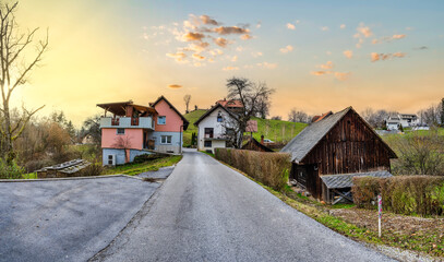 Fototapeta na wymiar Zale village on the upper hills on Kamnik during a beautiful sunset, Kamnik, Slovenia