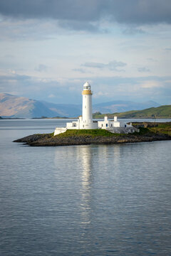 A lighthouse on the edge of a Scottish island