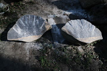 two pieces of splitted granite boulder rock