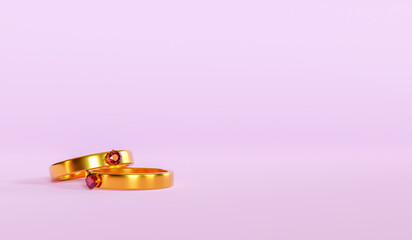 A pair wedding ring with a pink background and empty space