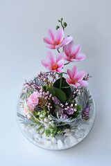 Bouquet of flowers in an aquarium vase