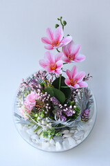 Bouquet of flowers in an aquarium vase