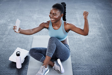 Gym, fitness or happy black woman taking selfie on workout, exercise or training break on social media. Wellness, smile or healthy African girl flexing, relaxing or taking pictures for online content