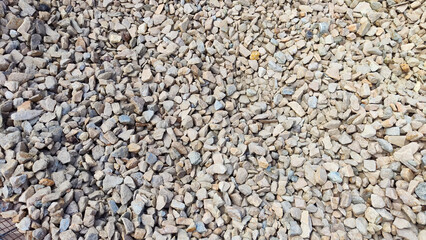 Gravel texture. Fine gray stone gravel. Natural textural background. Copy space and pattern