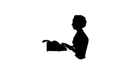 woman typing with old typewriter