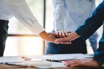 business teamwork concept and unity of young colleagues at the office