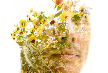 A double exposure technique portrait of a man and yellow flowers