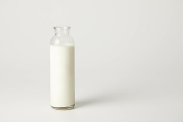 A bottle of milk of milk on a white background