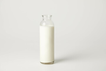 A bottle of milk of milk on a white background