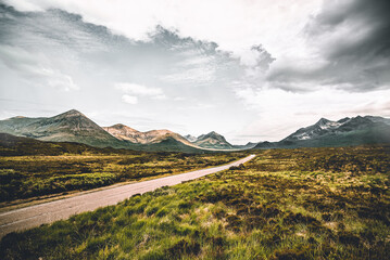 a scenic panoramic view of mountains tops in the Scottish highlands