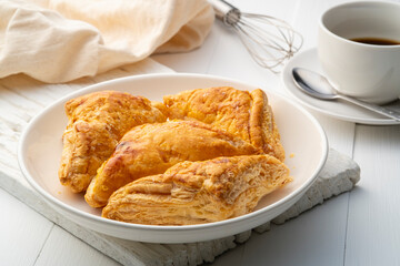 Baked Chicken Puff Pastry in white plate,healthy snacks
