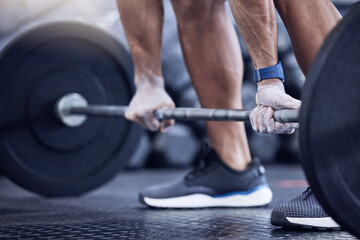 Man, training and hands with weight in a closeup at the club for workout with equipment. Male...
