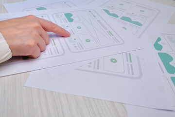 Woman designer create website design wireframe. Sketch, prototype, framework, layout future design...