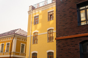 cityscape, urban background, group of facades of modern and vintage buildings