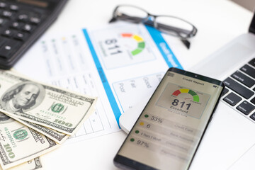 Credit report with score on a desk