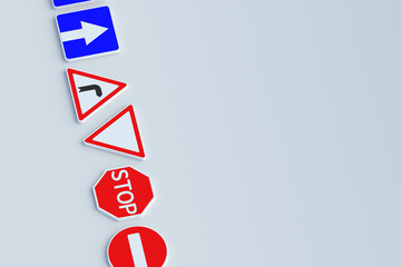 Row of road signs. Traffic laws. Driving school concept. Rules and regulation. Highway signpost. Roadway infrastructure. Top view. Copy space. 3d render