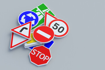 Heap of road signs. Traffic laws. Driving school concept. Rules and regulation. Highway signpost. Roadway infrastructure. Copy space. 3d render