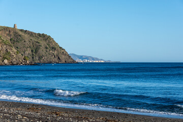 View of the Mediterranean coast from a beach in Almuñecar (Spain)