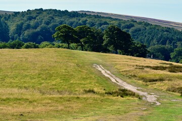 Fototapeta na wymiar Landscape with an road in the hills in summer, Disley, Stockport, England, UK