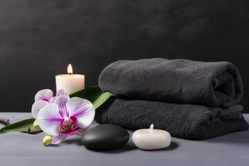 Obraz na płótnie Canvas towels, stones, candles, flowers in the massage parlour. Beauty spa treatment and relax. ai,ai generative, generative ai