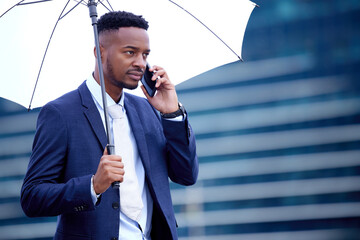 African business man, phone call and umbrella in city, street and communication on walk, travel and...