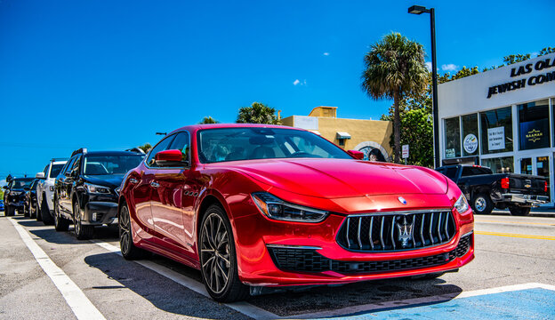 Miami, Florida USA - March 25, 2023: red 2016 Maserati Ghibli S Q4 parcked car vehicel, corner view