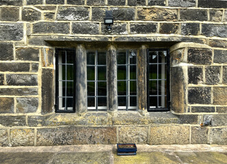 View of a 17th century, stone mullion window, in an old farmhouse near, Green Lane, Shelf, UK