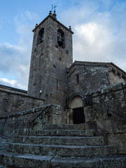 Fototapeta na wymiar View of the bell tower and the Romanesque church of San Esteban in the village of Allariz in the province of Ourense, Spain, summer of 2021