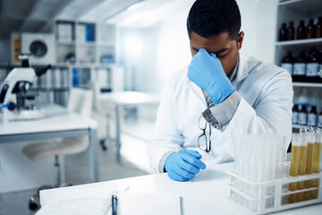 Science, stress and man scientist with headache in a laboratory, frustrated and crisis. Healthcare,...