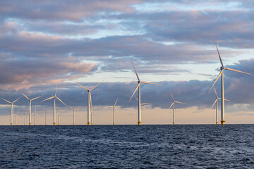 offshore wind farm at sunset