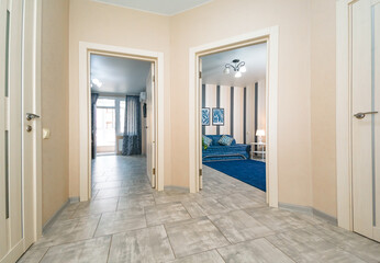 bright entrance hall corridor with open doors to the rooms apartment interior