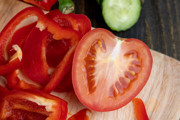 ripe tomatoes and green cucumber cut into pieces