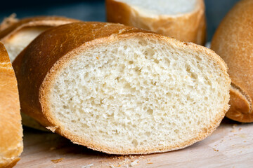 pieces of soft baguette on a cutting board