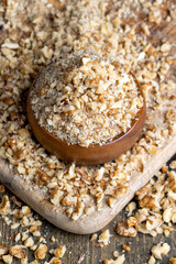 Crushed dried walnuts on the table