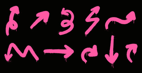 Set graffiti clip art. Urban street style. Collection of pink arrows. Isolated on black background. Splash effects and drops. Grunge and spray texture.