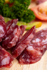 sliced sausage from pieces of meat with bacon