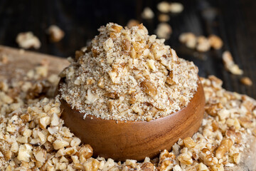 Crushed dried walnuts on the table