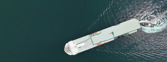 Aerial drone ultra wide photo of Neptune lines RoRo (Roll on-off) car transportation vessel...