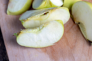 Sliced ripe apple on a cutting board