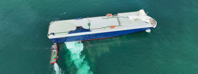 Aerial drone ultra wide photo of Neptune lines RoRo (Roll on-off) car transportation vessel...