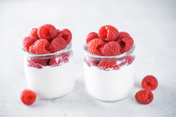 Greek yogurt raspberry parfait in a jar