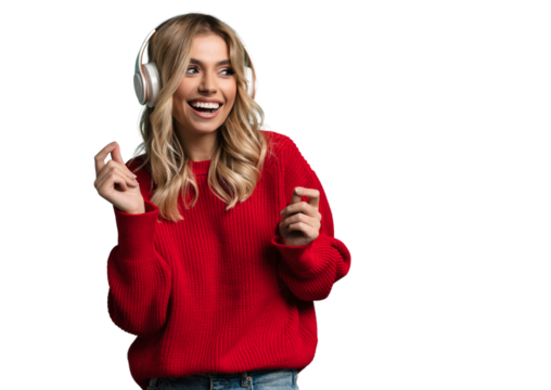 Portrait of charming blonde woman in massive headphones listening to music on transparent