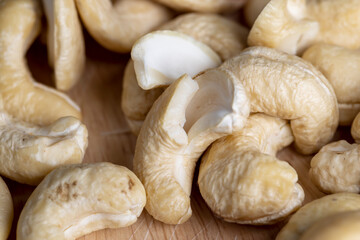 Fresh peeled cashew nuts on the table