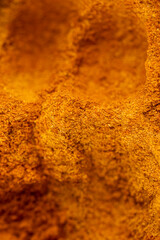 ground turmeric is orange in color for use in cooking