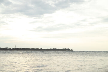 Lombok and Gili Air islands, overcast, cloudy day, sky and sea. Sunset, sand beach.