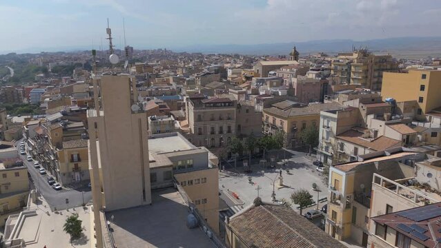 flying counter clockwise around piazza in Gela Sicily