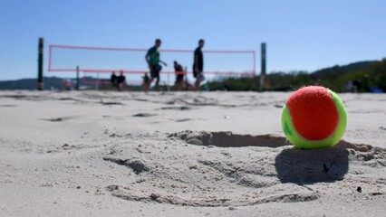 people playing beach tennis